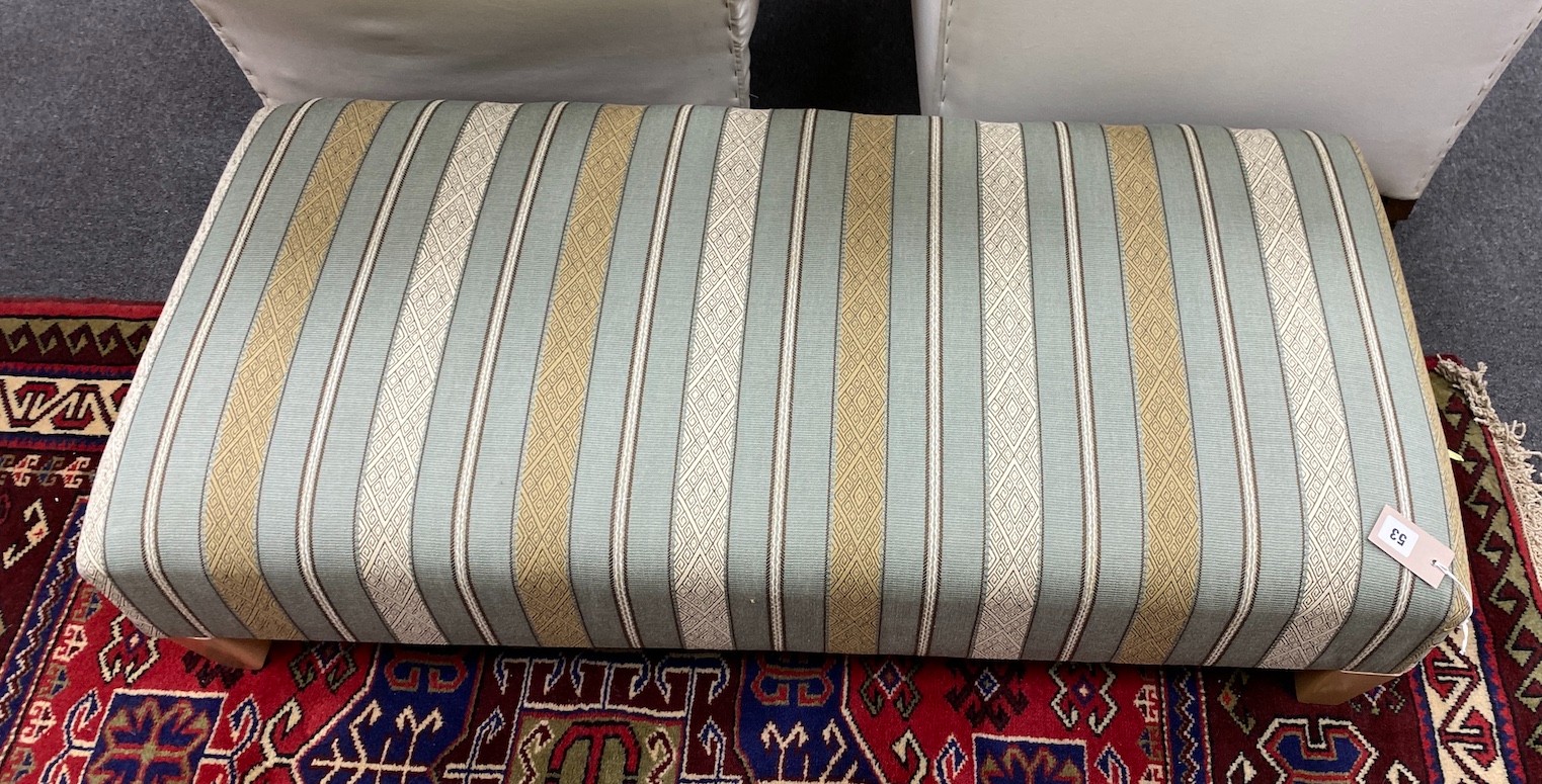 A contemporary rectangular footstool upholstered in Kravet stripe fabric width 117cm, depth 56cm, height 28cm